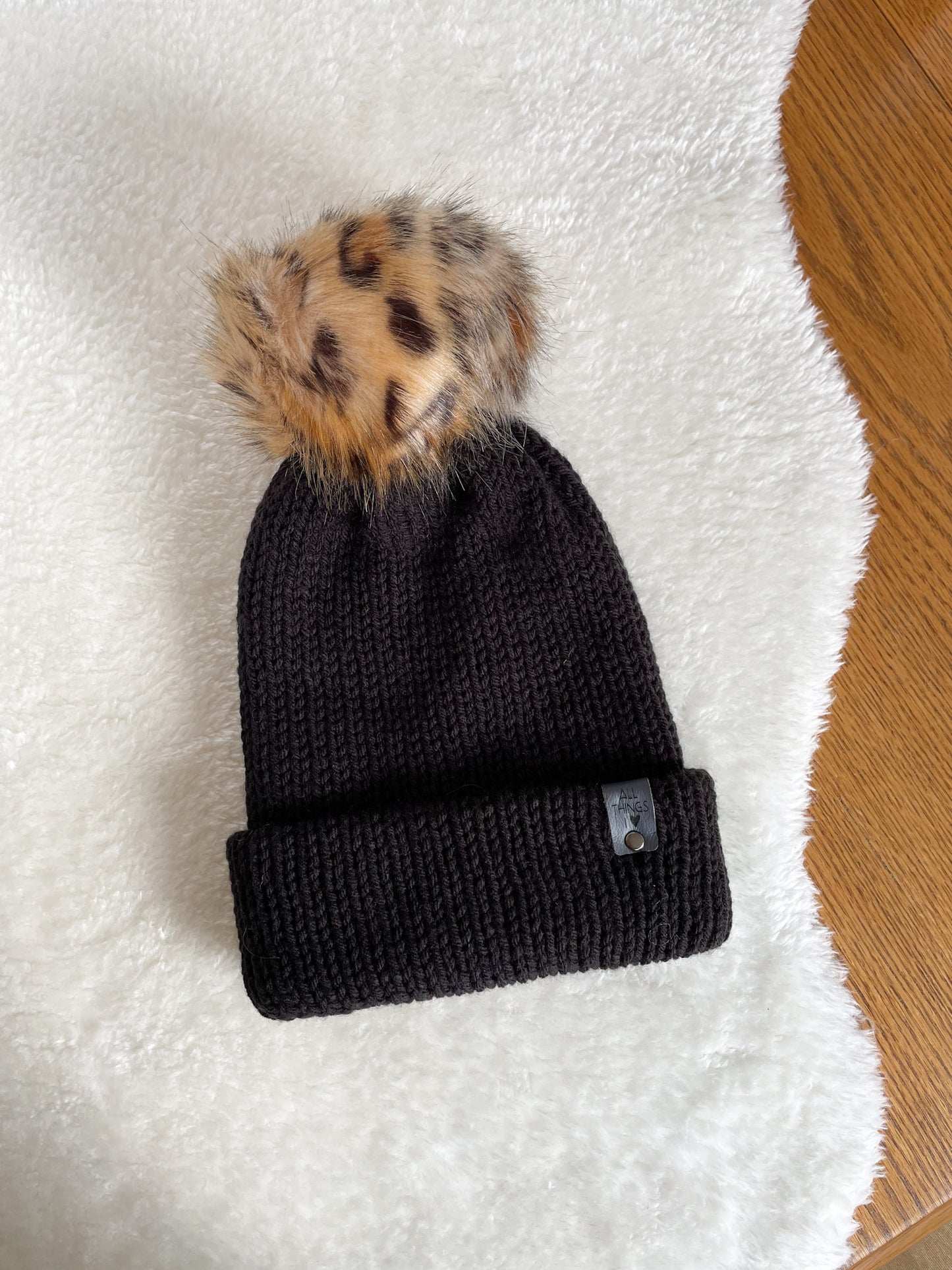 READY TO SHIP - KNIT BRIM POM BEANIE, BLACK WITH LEOPARD POM, LARGE