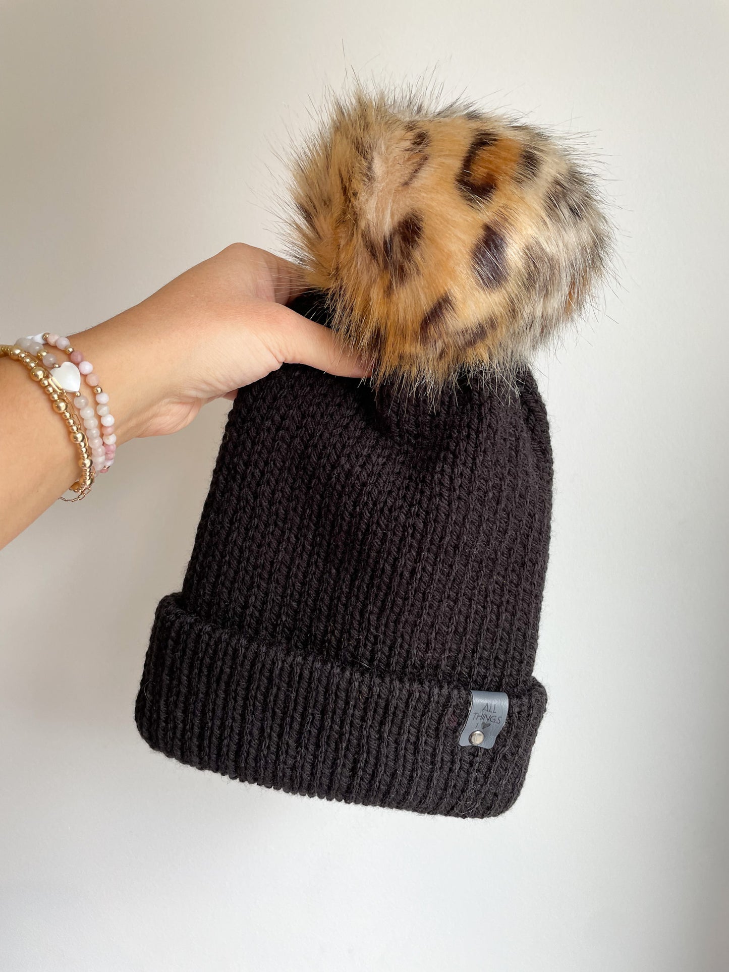 READY TO SHIP - KNIT BRIM POM BEANIE, BLACK WITH LEOPARD POM, LARGE